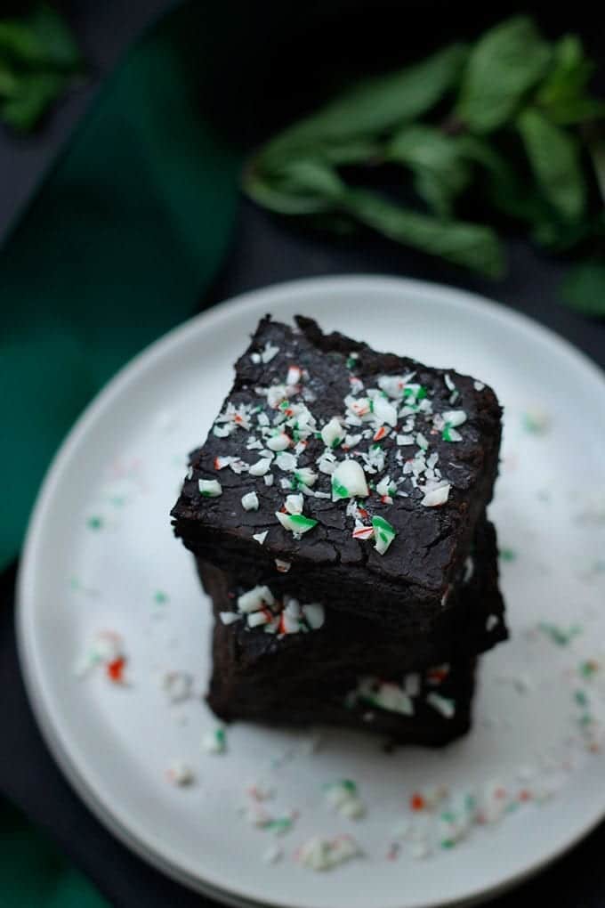Peppermint Black Bean Brownies - No one needs to know there's black beans hidden in these delicious brownies. They're also grain-free, sweetened with maple syrup and lightened-up with applesauce. 
