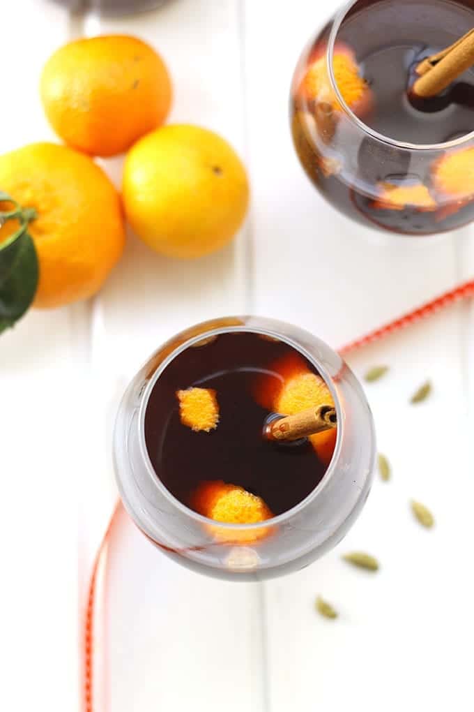 Orange Chai Mulled Wine - a seasonal drink recipe with a chai twist! Serve this at all of your holiday parties and your guests will be blown away.