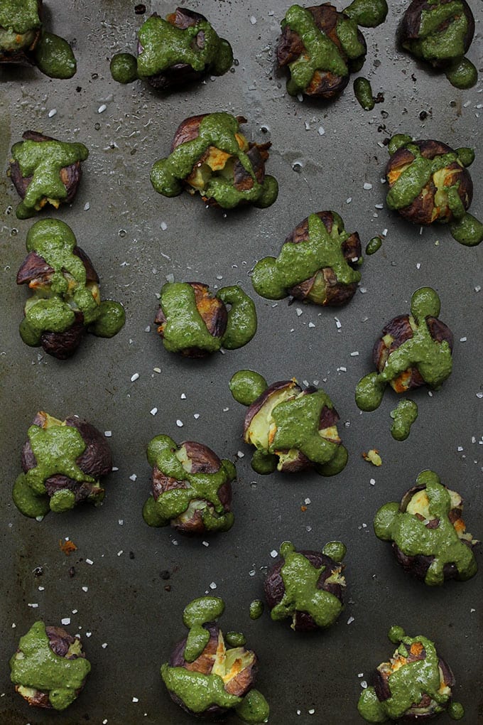 Grab your potato mashers cause these pesto smashed potatoes will have you craving those spuds all day long. Your new favorite potato recipe!