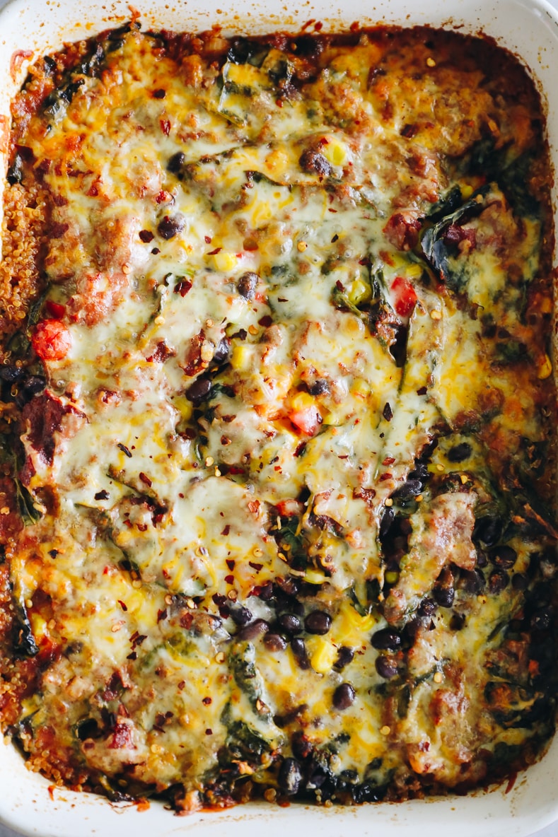 Overhead shot of a quinoa taco casserole in a baking dish.