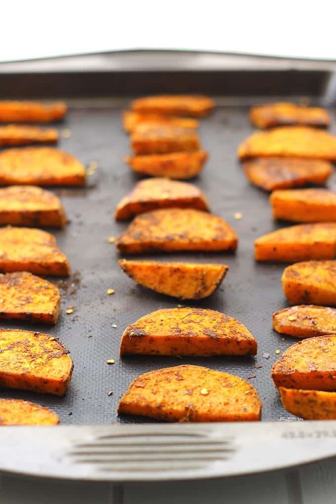 These sweet and savory Maple Chipotle Sweet Potato Wedges are your next dinner staple! They're tossed in olive oil and real maple syrup, sprinkled with spices, and baked on high heat until crispy and caramelized.