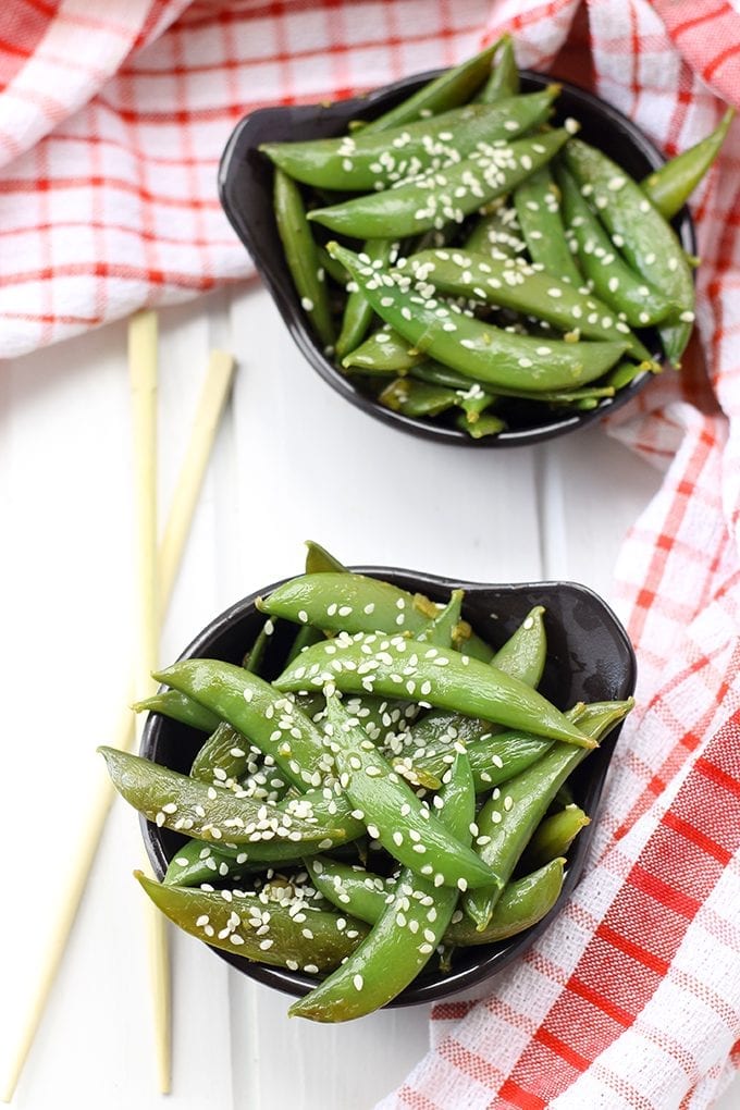 Get in your greens with this Healthy Asian Snap Pea Salad. It's super simple to make and coated with a light sesame-ginger dressing. You'll definitely be going back for seconds!