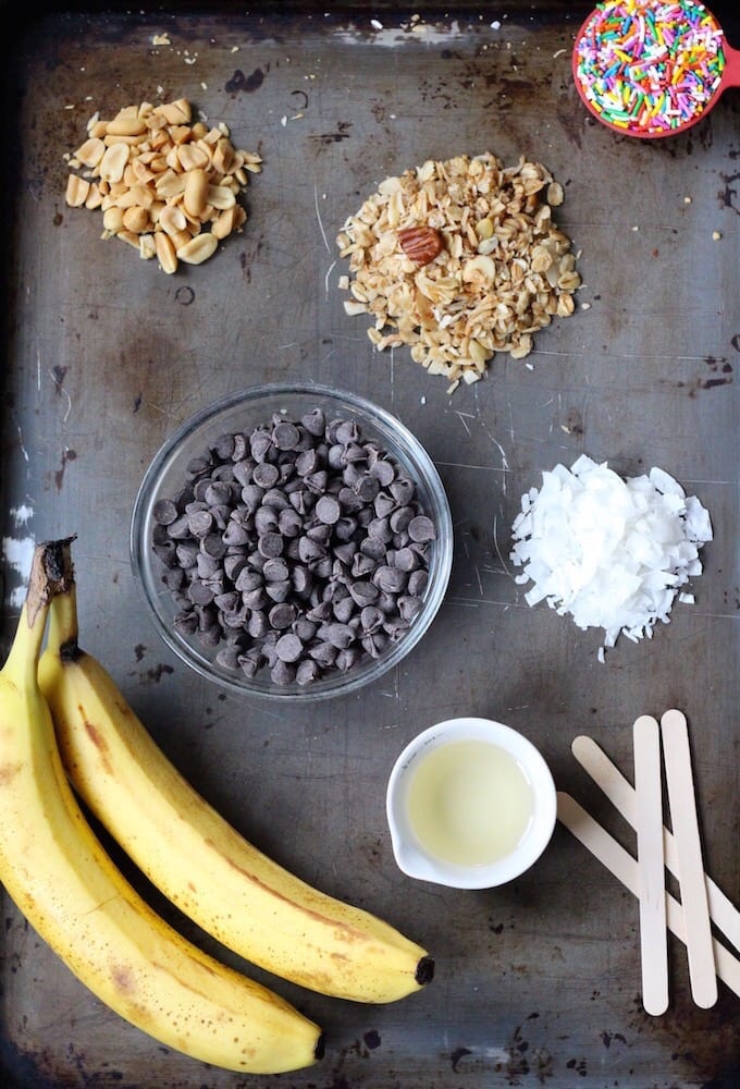 A healthy summer snack made with 3 simple ingredients! These Chocolate Covered Banana Popsicles are easily customizable, kid-friendly, and a delicious recipe straight out of the freezer.