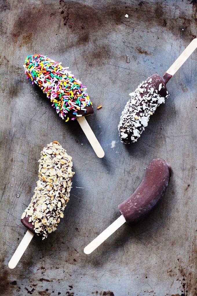 A healthy summer snack made from 3 simple ingredients! These Chocolate-Covered Banana Pops are easily customizable, kid-friendly and a delicious recipe straight from the freezer.