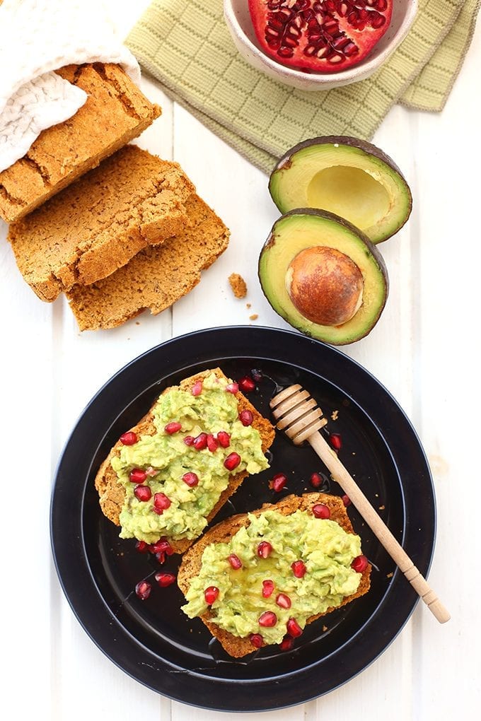 Fresh cornbread topped with mashed avocado, honey and pomegranate seeds make this Cornbread Avocado Toast recipe a delightful snack or breakfast for Fall. It also makes a great appetizer for Thanksgiving!