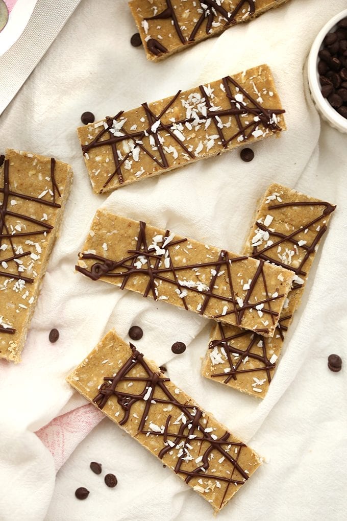 Ditch the store-bought and go for one of these Vegan Almond Joy Protein Bars instead. Made with plant-based protein powder and ready in under 30 minutes (without a food processor!) these healthy, no-bake protein bars will become your new favorite snack.