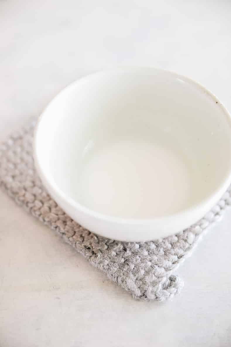 Mixture of tapioca starch and water in a white bowl.