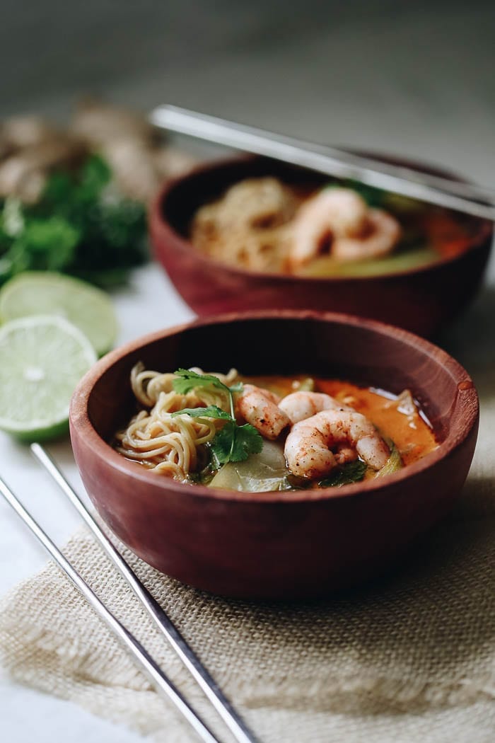 This Curried Thai Coconut Ramen with Shrimp is zesty and spicy with a protein boost from the shrimp and whole-grain, gluten-free noodles. A bone-warming soup recipe that comes together in 40 minutes.