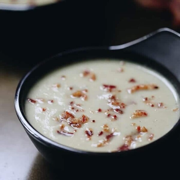 This Creamy Cauliflower Soup with Crispy Bacon is comfort food at its finest. But we've ditched the cream for the smooth sweetness of coconut milk, which pairs perfectly with the crunchy bacon bits sprinkled on top. This is not your average soup recipe!