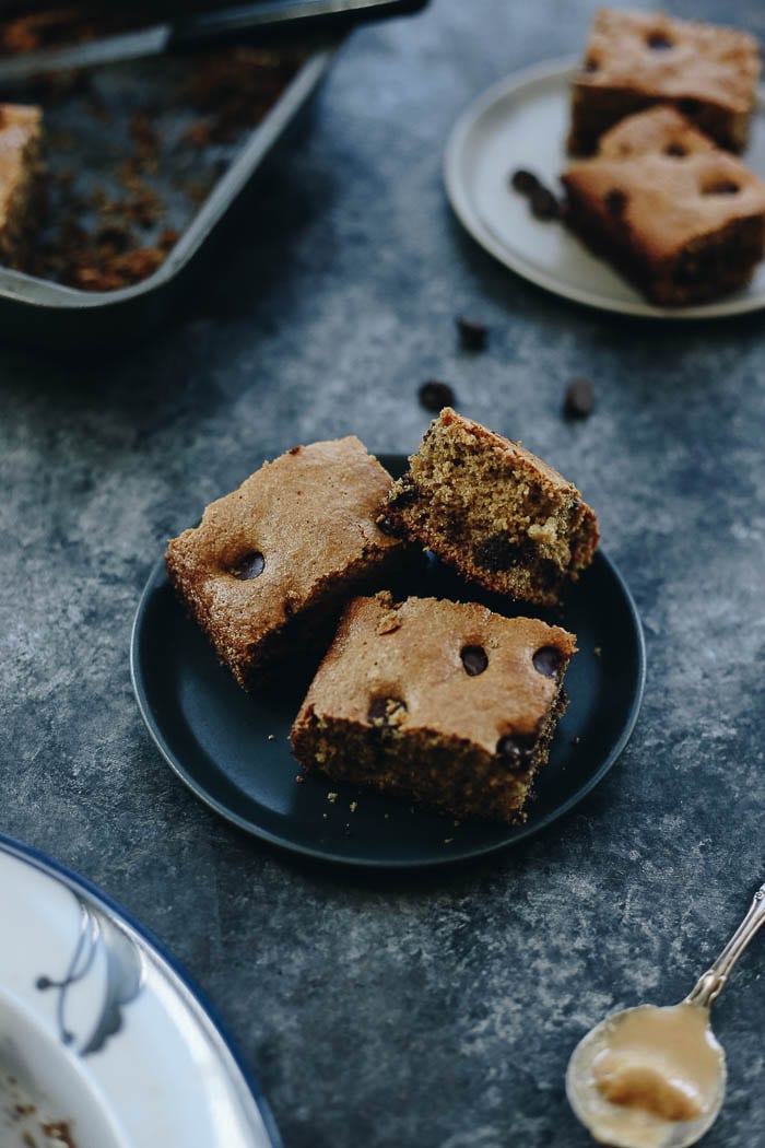 Never tried baking with tahini? Start with these Chocolate Chip Tahini Bars! They're chewy and packed with melted chocolate for a decadent sweet made with healthier ingredients.