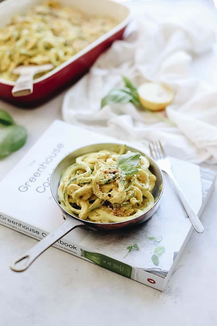 Mac and cheese just got a healthy makeover with this spiralized zucchini mac and cheese recipe! Seasonal zoodles are coated with a vegan cheeze sauce and topped with a delicious oat crumble for your next weekday dinner!