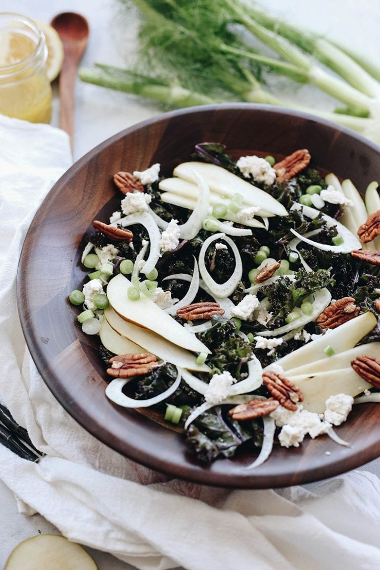 A crisp fall salad on a bed of massaged kale, this Pear Fennel and Ricotta Kale Salad will make dinner prep a breeze for those cooler and darker fall evenings.