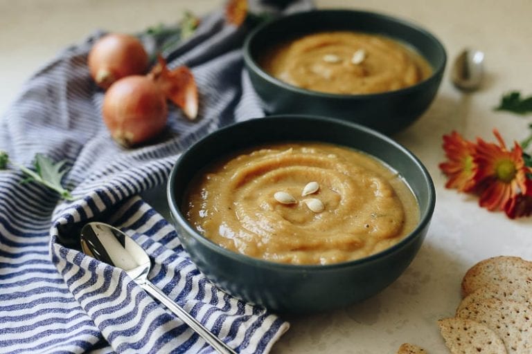 This healthy, autumn Roasted Acorn Squash Soup is sweet and savory with a lightly roasted flavor to make a delicious and filling fall recipe for the whole family.