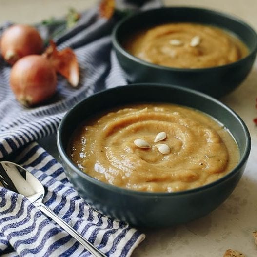 This healthy, autumn Roasted Acorn Squash Soup is sweet and savory with a lightly roasted flavor to make a delicious and filling fall recipe for the whole family.