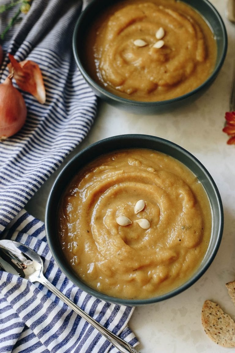 This healthy, autumn Roasted Acorn Squash Soup is sweet and savory with a lightly roasted flavor to make a delicious and filling fall recipe for the whole family.