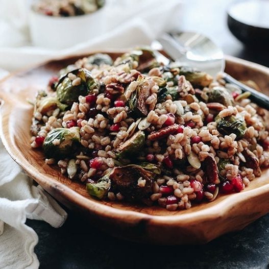 farro grain salad in a wooden bowl