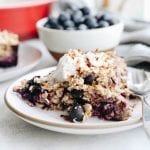 Change up your breakfast game with this Blueberry Coconut Baked Oatmeal. An easy, vegan, breakfast option that you can bake ahead of time for weekday breakfasts or fresh for a fancy weekend brunch.