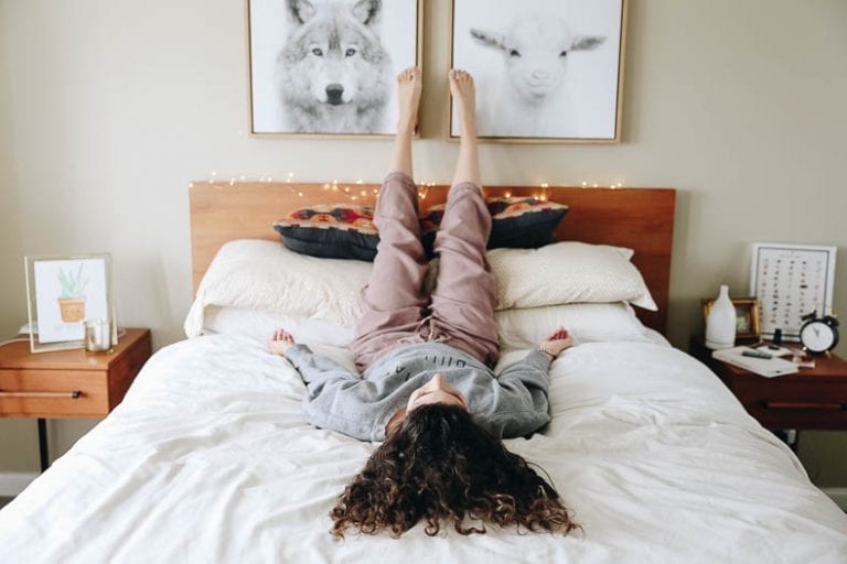 Struggling with sleep issues or looking to build better sleep hygiene? Try yoga for sleep! These yoga poses will help relax your body into a restful night of sleep. #yoga #yogaforsleep #sleep