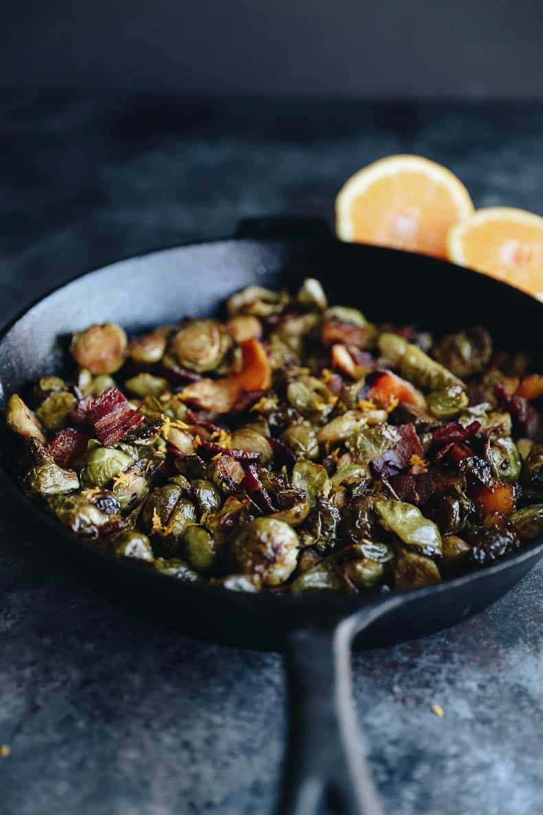 Enjoy these Maple Roasted Brussels Sprouts with Bacon as a holiday side or winter weeknight dish. Packed full of flavor from fresh orange and smoky bacon, these brussels sprouts will not disappoint.