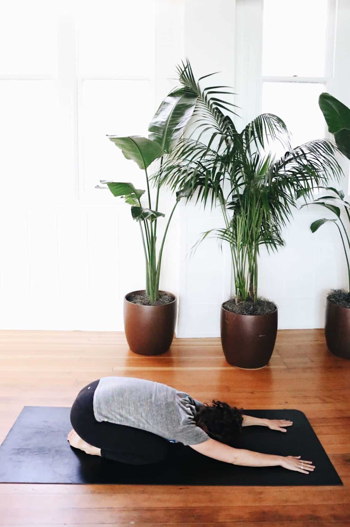 Feeling stressed-out and overwhelmed? Try yoga for stress relief! Here are 8 yoga poses to relieve your stress, allow you to feel more grounded and tackle life with energy and compassion. #stressrelief #yogaforstress