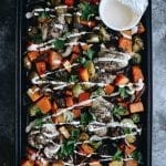 Want a healthy and hearty dinner without all the work? This Tangy Za'atar Chicken with Veggies is made entirely on a sheet-pan for easy clean-up and quick cooking that the whole family can enjoy. Don't forget the spicy yogurt sauce!