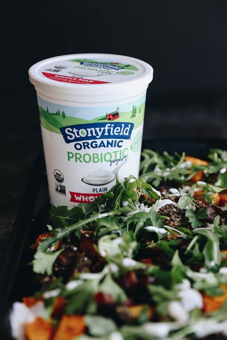 Stonyfield Organic yogurt is drizzles over this easy sheet-pan dinner of tangy za'atar chicken and veggies #sheetpan #dinner