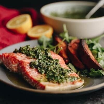 Delicious and healthy baked chimichurri salmon which is ready in under 20 minutes. Perfect for a delicious weeknight dinner #chimichurri #salmon
