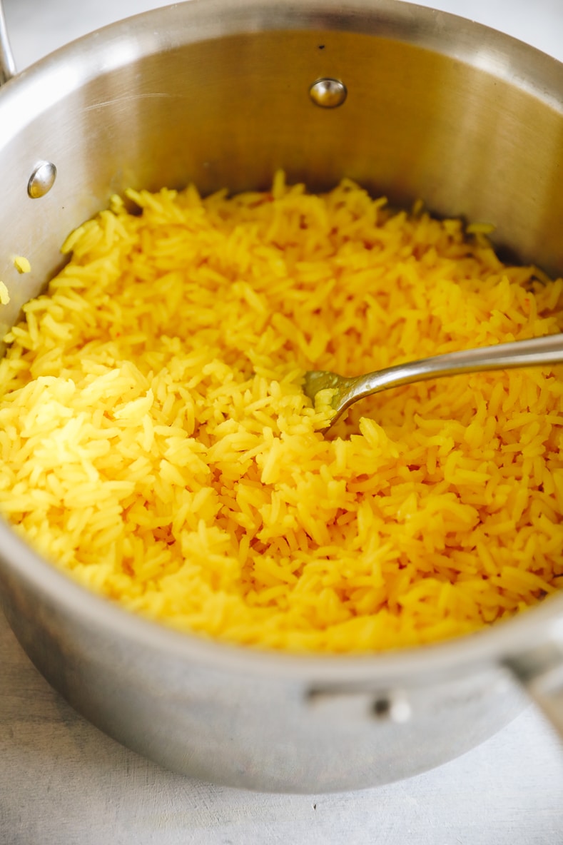 yellow saffron rice recipe in a metal pot