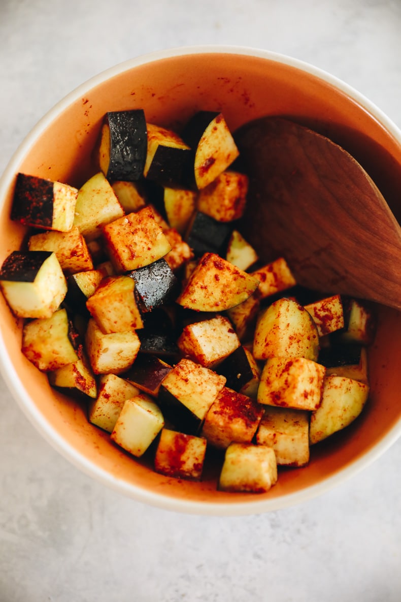 marinated eggplant cubes in a bowl