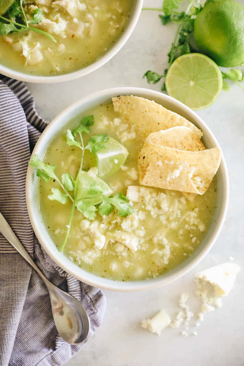 overhead photo of chicken pozole in a bowl