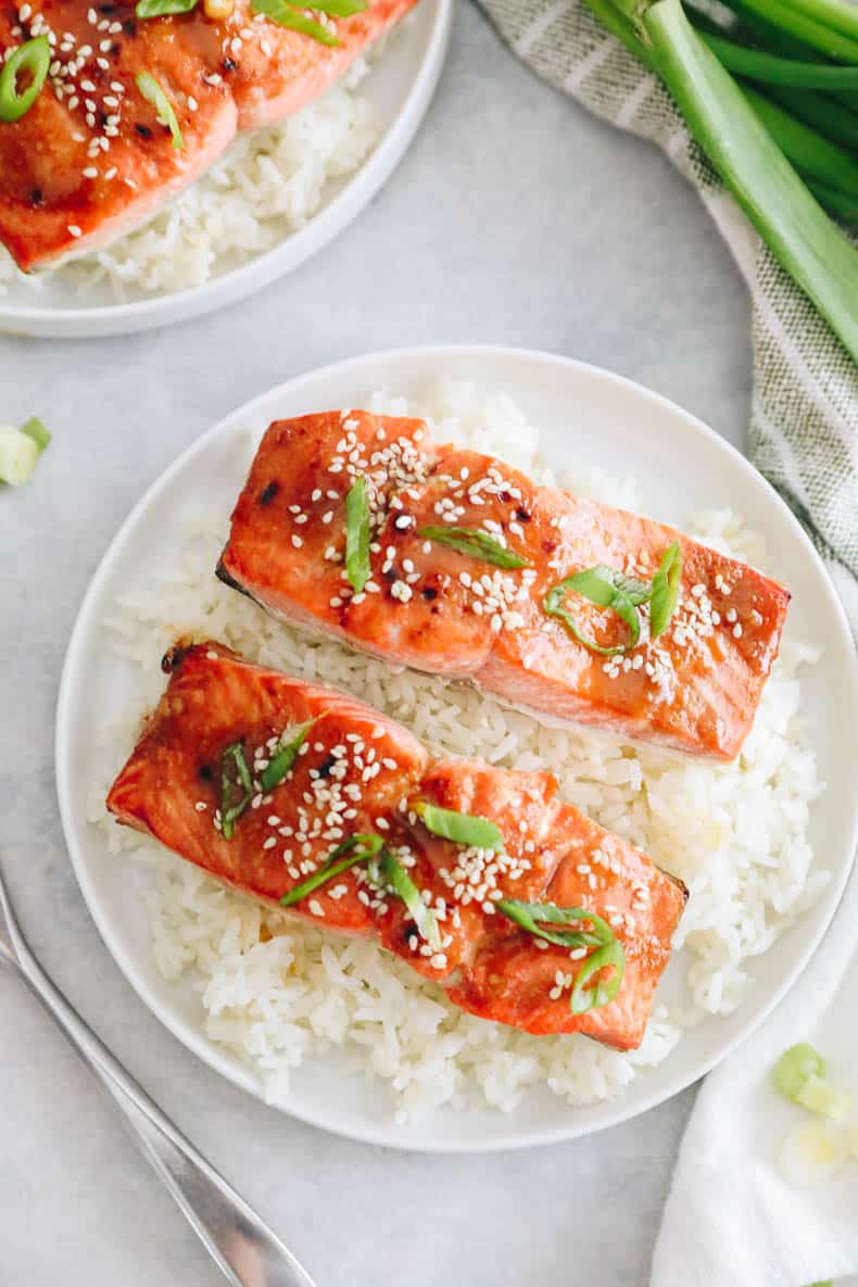 overhead photo of miso salmon on a bed of rice.