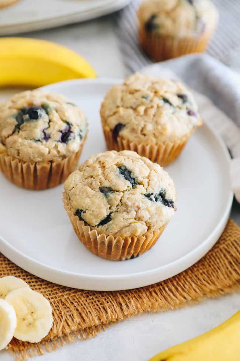 banana blueberry muffins on a white plate