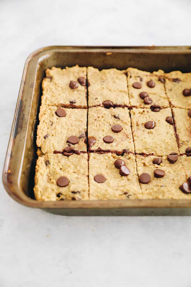 cut blondies in a baking dish.