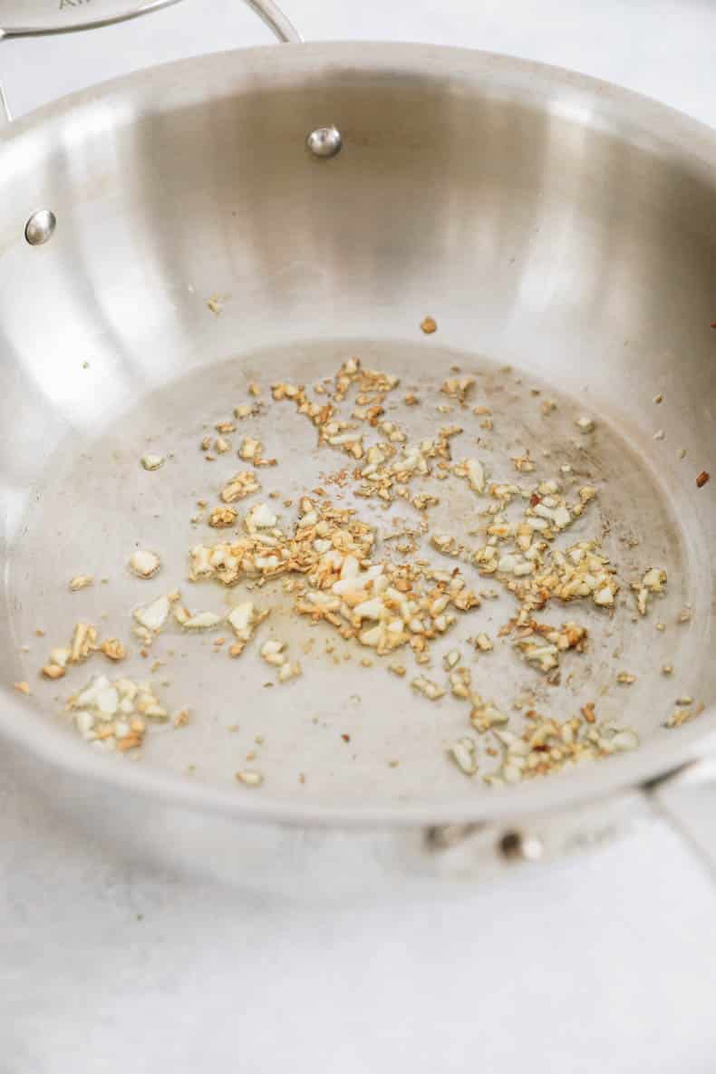 Garlic sauted in a pot.