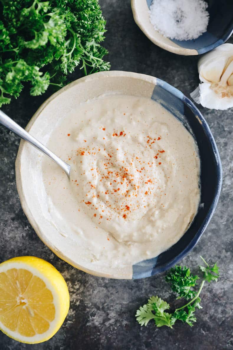 overhead of tahini sauce recipe in a bowl.