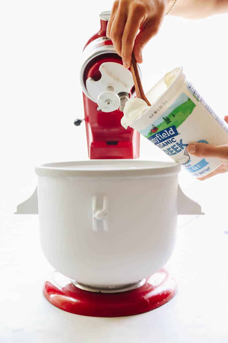 Yogurt Being Added to a Frozen Yogurt Machine
