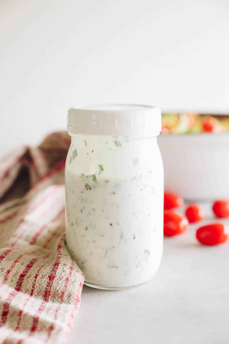 Greek yogurt ranch dressing in a mason jar.