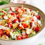 Copycat Panera Bread BBQ Chicken Salad in a large salad bowl with greek yogurt ranch dressing.