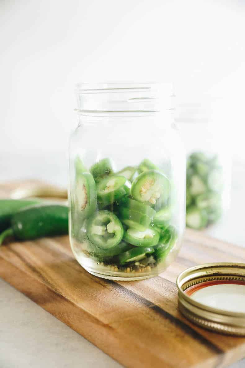 chopped jalapenos in a mason jar