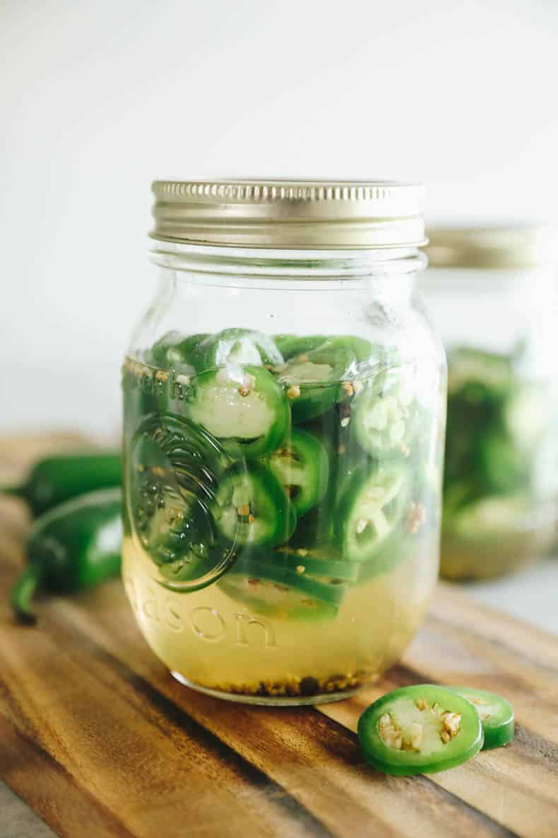 Pickled Jalapeño Recipe in a pint sized mason jar