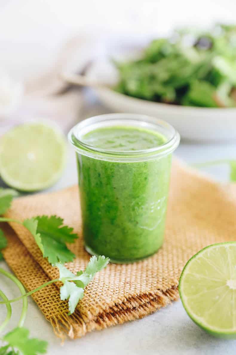 Cilantro lime dressing blended in a mason jar.