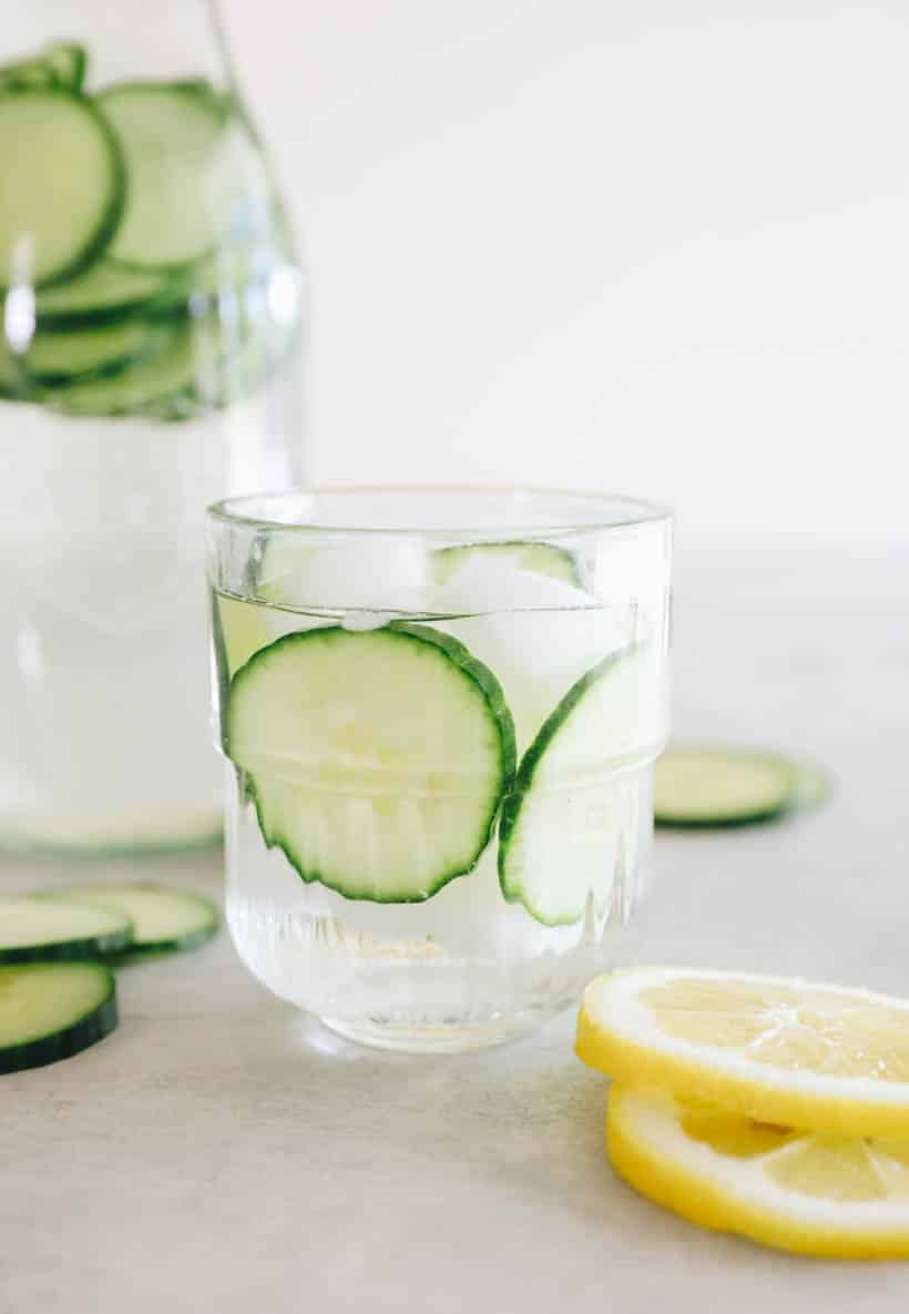 cucumber water in a small clear glass.