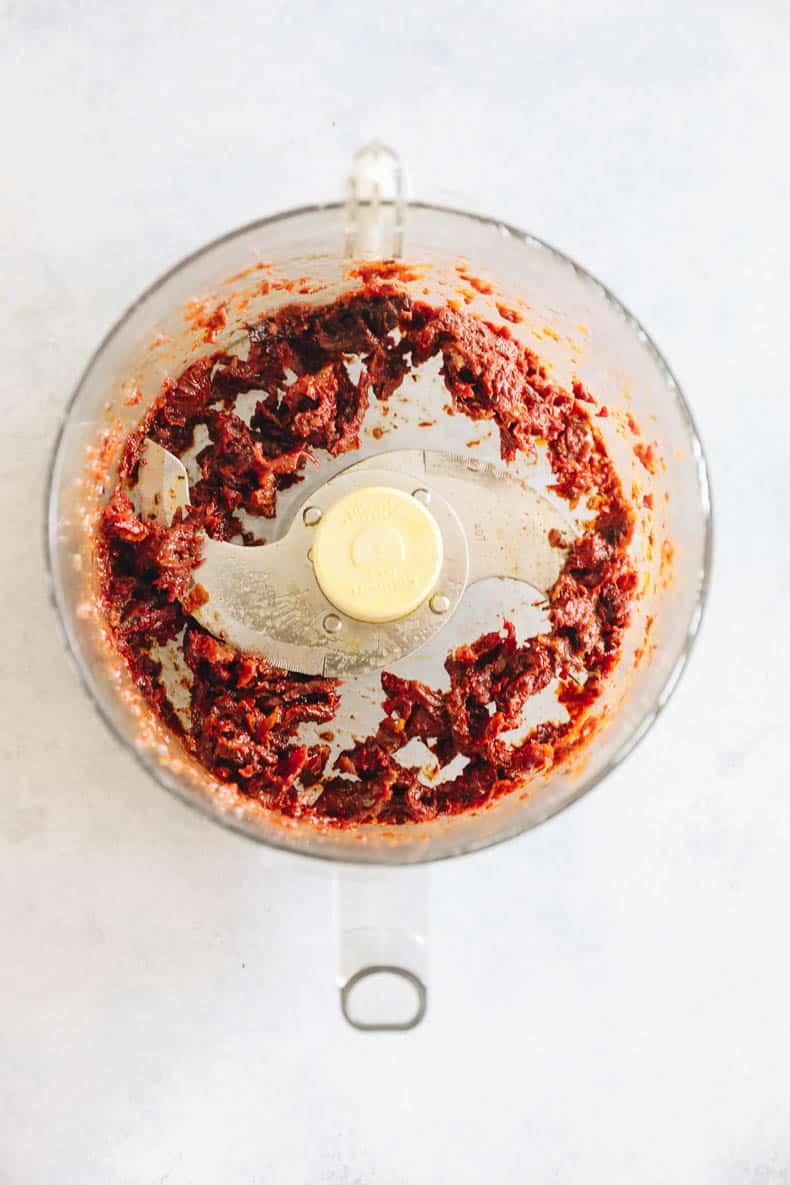 pulsed sun dried tomatoes in a food processor