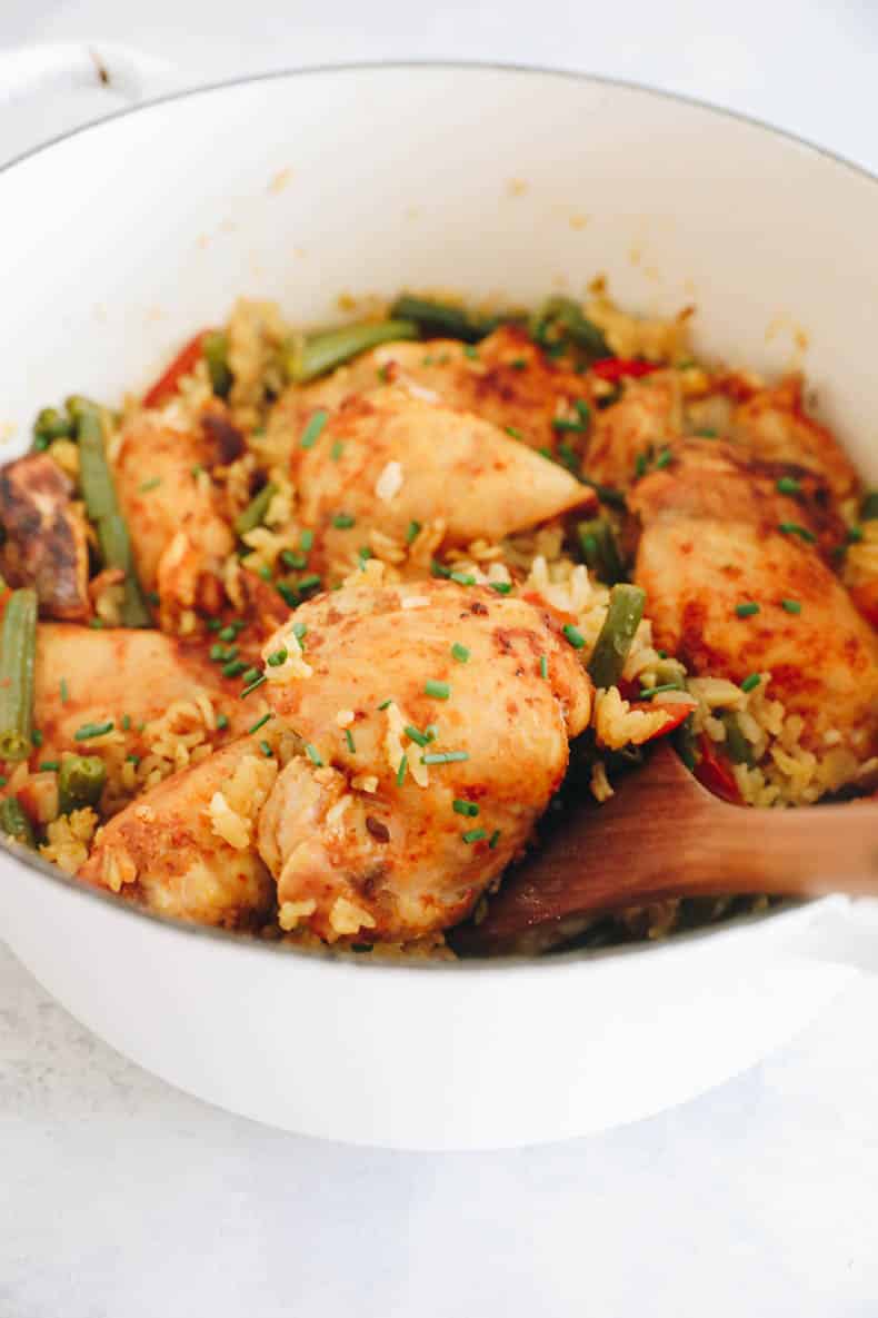 close up image of a chicken thigh in this one pot chicken and rice recipe.