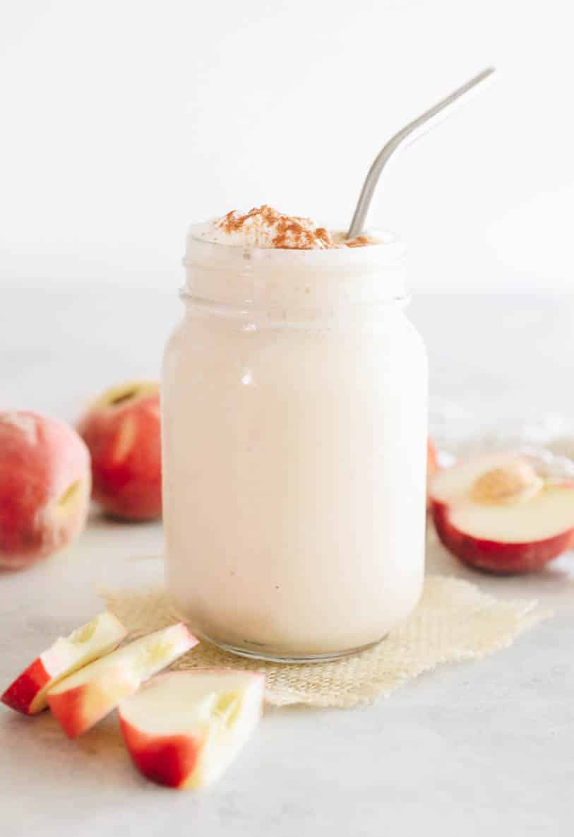 Peach smoothie in a mason jar.