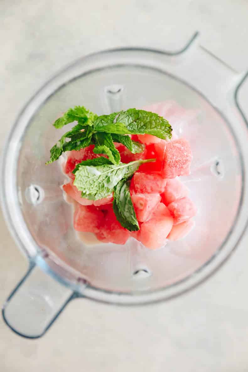 ingredients for a watermelon smoothie in a blender.