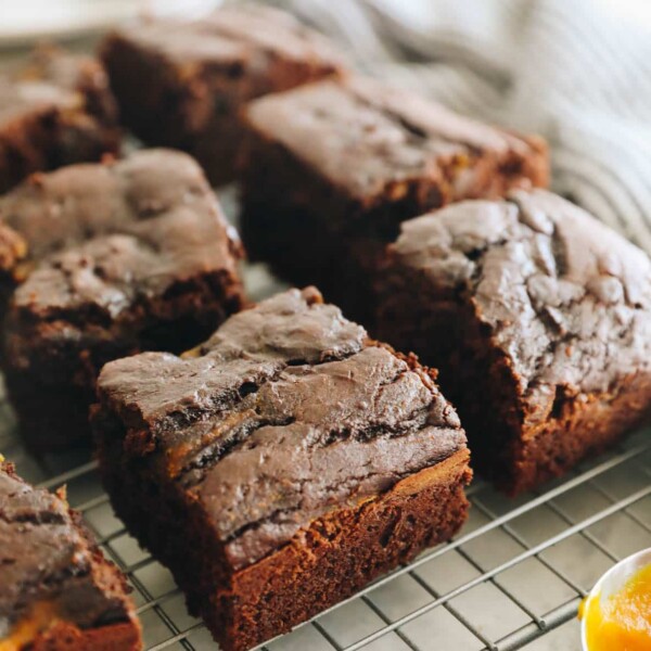 pumpkin brownies on a wire rack.