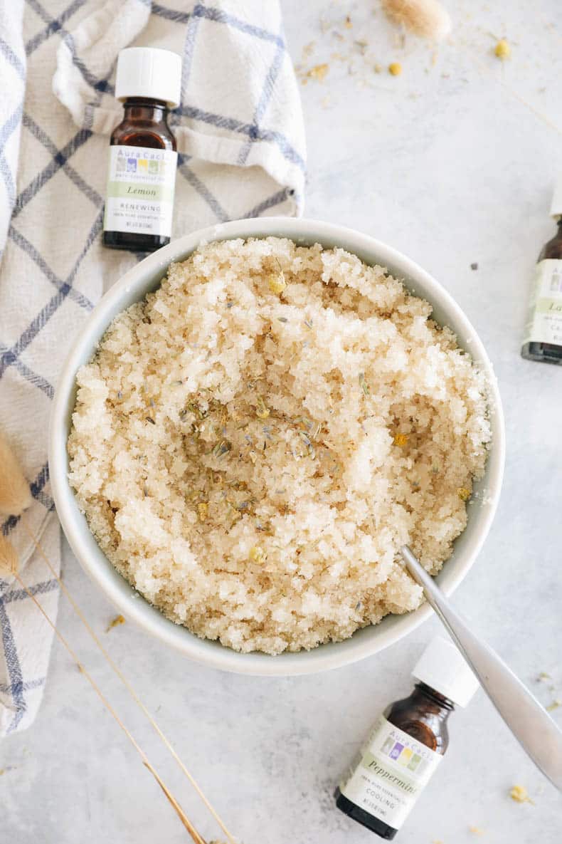 overhead image of ingredients in homemade sugar scrub in a white bowl.