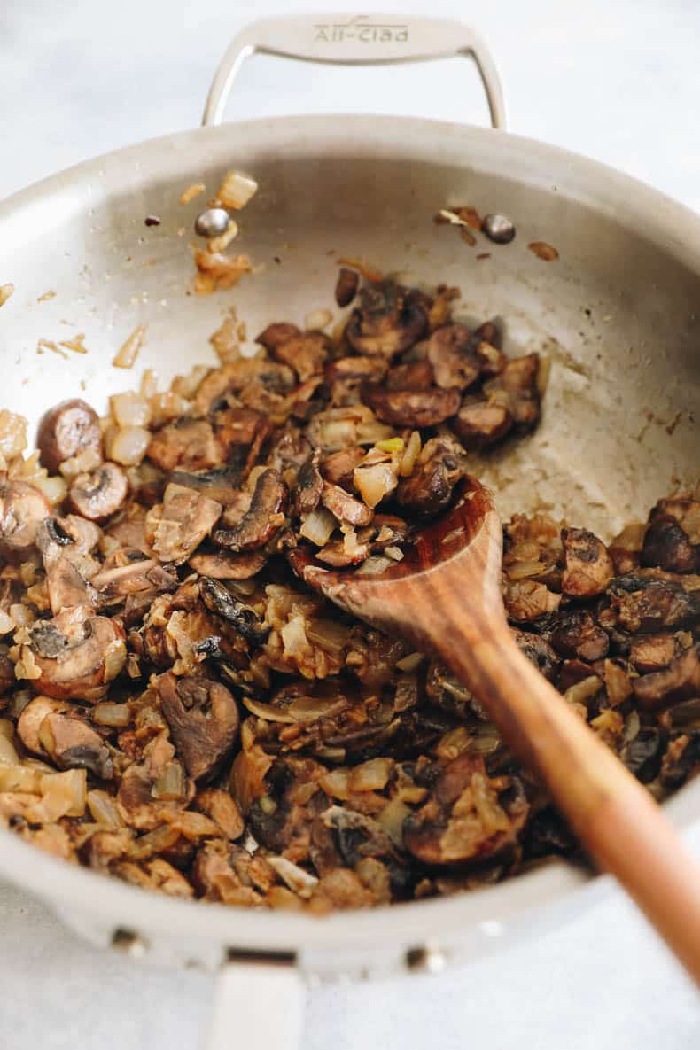 Mushrooms sauteed in a pan for mushroom stroganoff