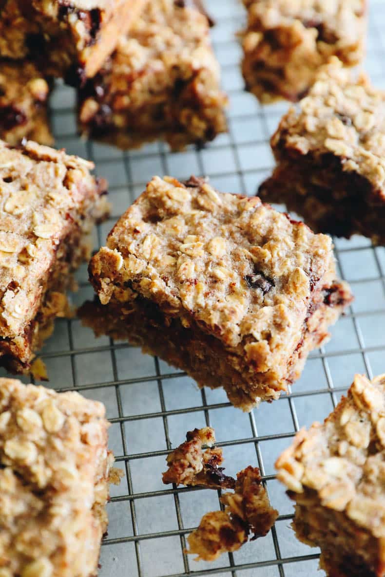 Oatmeal breakfast bars cooling on a wire rack.